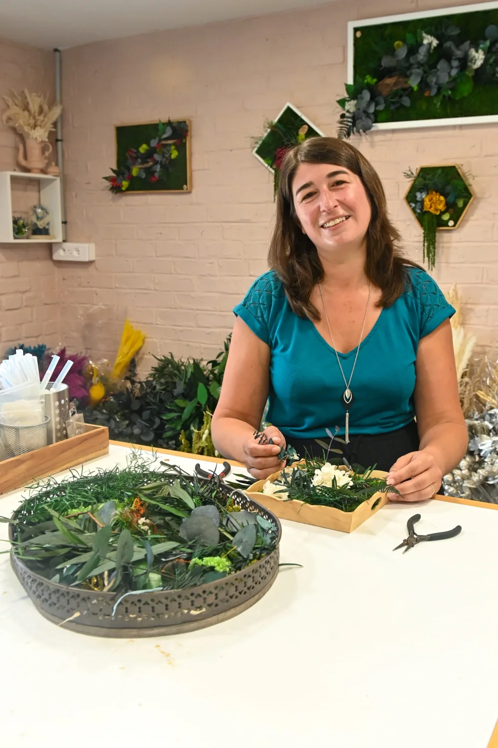 Portrait d'une fleuriste dans son atelier, reportage entreprise